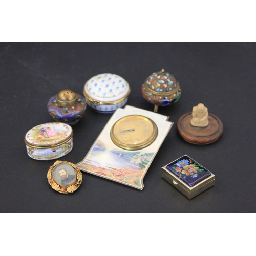 308 - A small timepiece, in enamelled flat case, 19cm high, two cloisonné enamelled pots, a pinchbeck memo... 