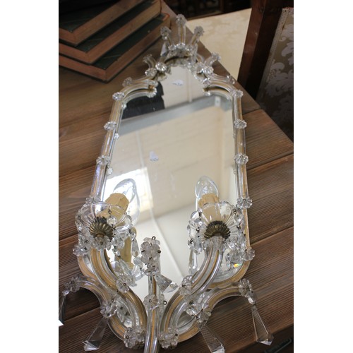 309 - A glass framed girandole mirror, 79cm x 26cm wide.