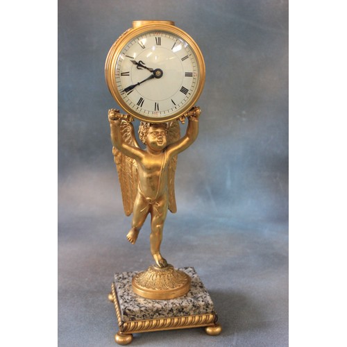 19 - A late 19th/early 20th century French mantel  timepiece, gilt metal case, supported by a figure of c... 