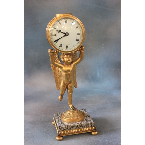 19 - A late 19th/early 20th century French mantel  timepiece, gilt metal case, supported by a figure of c... 