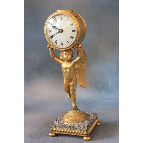 19 - A late 19th/early 20th century French mantel  timepiece, gilt metal case, supported by a figure of c... 