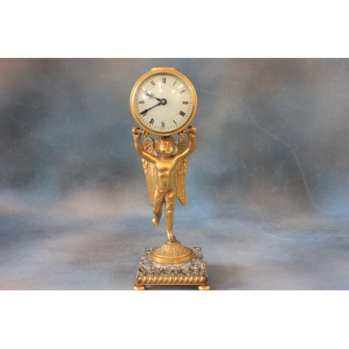 19 - A late 19th/early 20th century French mantel  timepiece, gilt metal case, supported by a figure of c... 