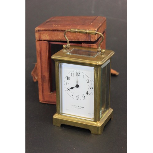 1 - A Gilt-brass carriage timepiece, 13cm high, with carrying case a.f.