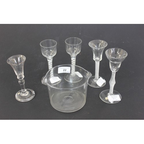 22 - A Georgian plain glass ice bowl, and five opaque twist and knopped stem coridal glasses, one with ch... 