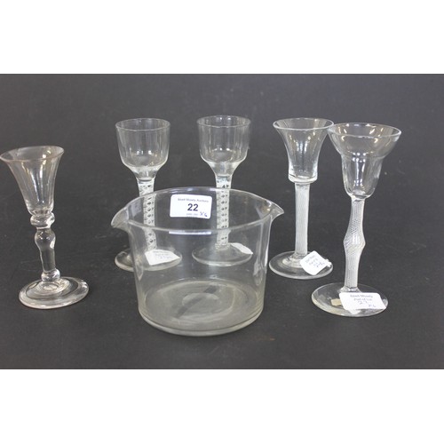 22 - A Georgian plain glass ice bowl, and five opaque twist and knopped stem coridal glasses, one with ch... 