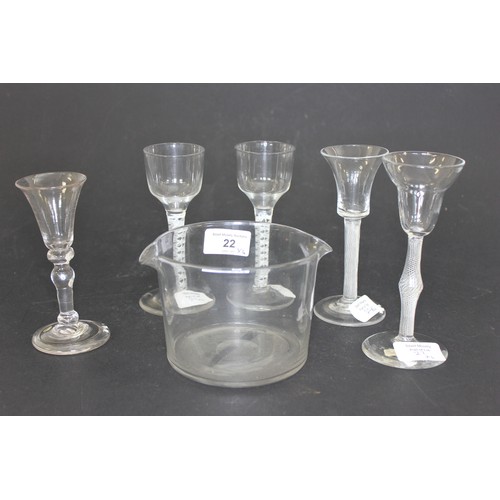 22 - A Georgian plain glass ice bowl, and five opaque twist and knopped stem coridal glasses, one with ch... 