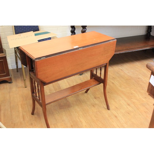 46 - An Edwardian mahogany Sutherland table, the flaps with canted corners, on shaped, slender legs, 76cm... 