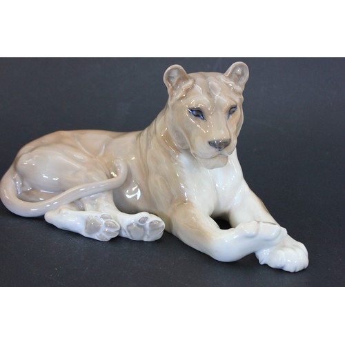 49 - A Royal Copenhagen figure of a recumbent lioness, 27cm long.