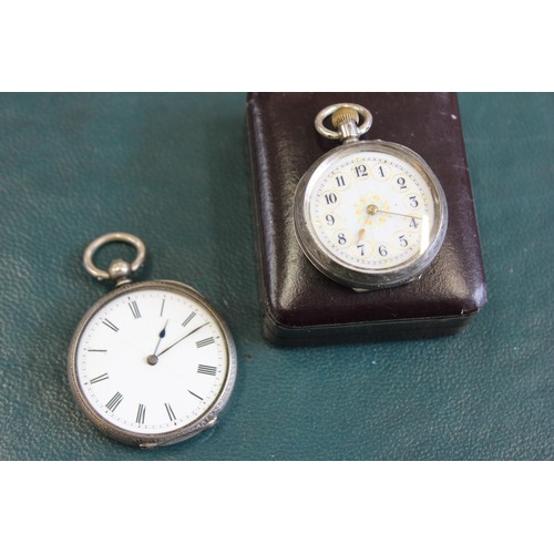 30 - A lady's fob watch in white metal case, with decorative enamelled dial, and another watch with white... 