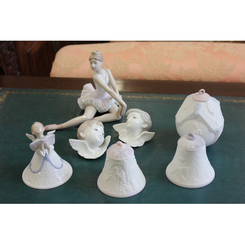 32 - Two Lladro Angel heads 