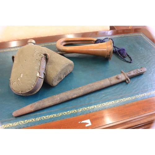 86 - A Lee Enfield number 3 mark 1 bayonet in scabbard, a premier bugle, and two water bottles (4).