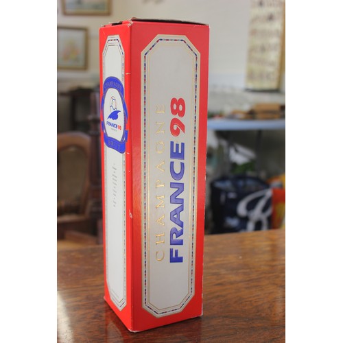 63 - A bottle of France 98 champagne to commemorate the Football World Cup, in box.