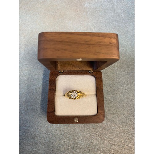 1 - An 18ct gold gent's signet ring, set a single diamond, approx. .92 carats, and approx. 6g, size Q.