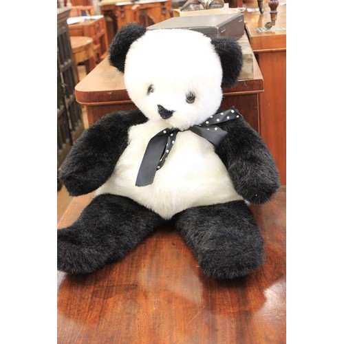 4 - A Merrythought panda bear in seated position, 43cm high.