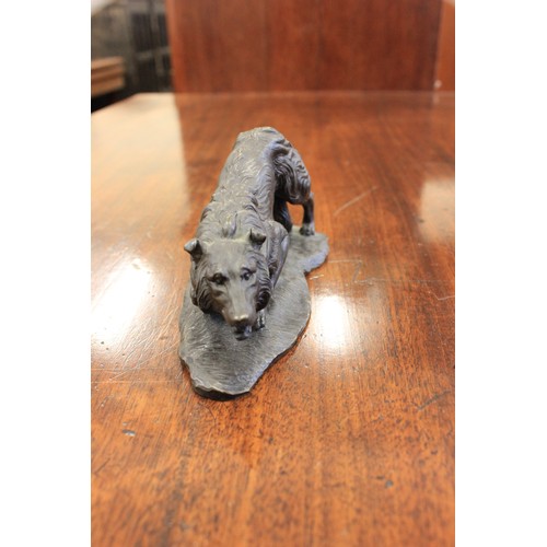 7 - A Heredities resin figure of a collie dog, 14cm long.