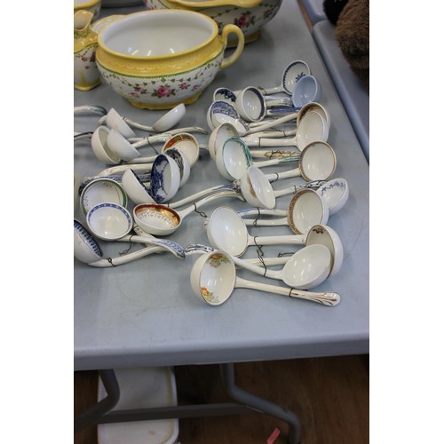 219 - A collection of English Victorian pottery sauce ladles by various manufacturers. (63).