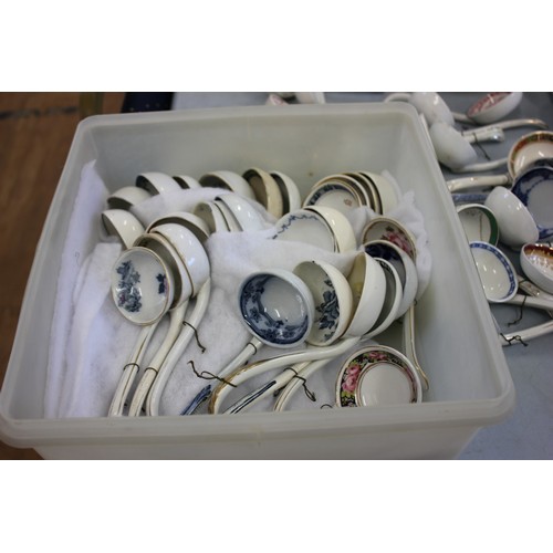 219 - A collection of English Victorian pottery sauce ladles by various manufacturers. (63).