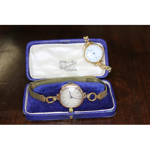 227 - A lady's gold Waltham wristwatch, a further gold wristwatch, both boxed, a.f. (2)