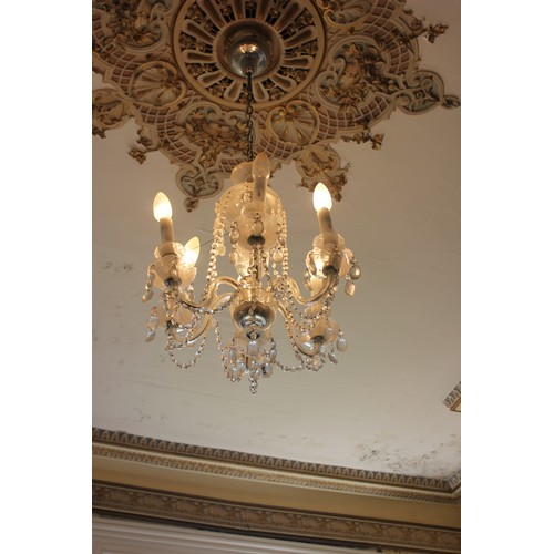 5 - A six-branch glass drop chandelier.