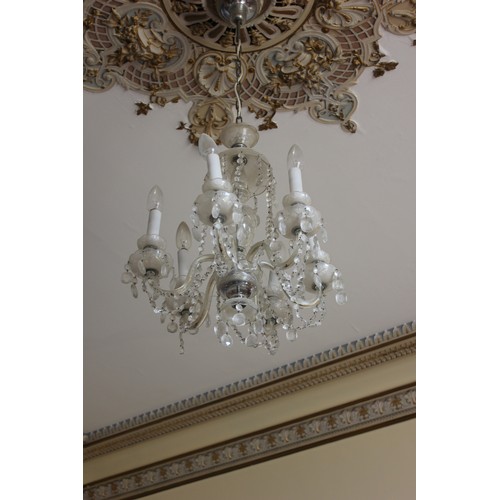 5 - A six-branch glass drop chandelier.