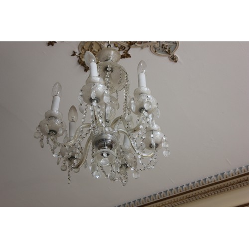 5 - A six-branch glass drop chandelier.