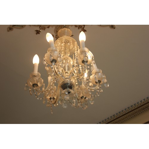 5 - A six-branch glass drop chandelier.