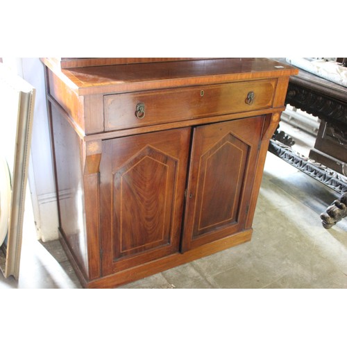 16 - A Regency-style mahogany bookcase cabinet, with lion mask ring handles, satinwood banding, on later ... 