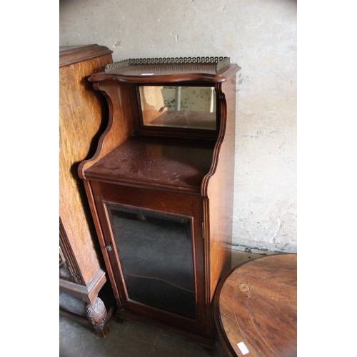 17 - A Victorian low oval occasional table, 75cm x 102cm, a Victorian music cabinet (2).