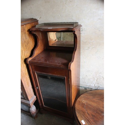 17 - A Victorian low oval occasional table, 75cm x 102cm, a Victorian music cabinet (2).