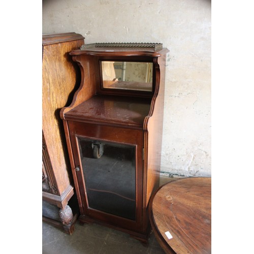 17 - A Victorian low oval occasional table, 75cm x 102cm, a Victorian music cabinet (2).