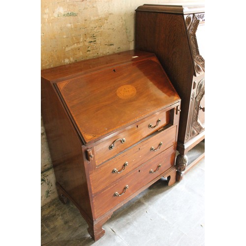 19 - A small early 20th century carved oak bureau, 61cm wide, and an Edwardian inlaid mahogany bureau, 70... 