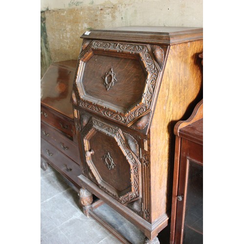 19 - A small early 20th century carved oak bureau, 61cm wide, and an Edwardian inlaid mahogany bureau, 70... 