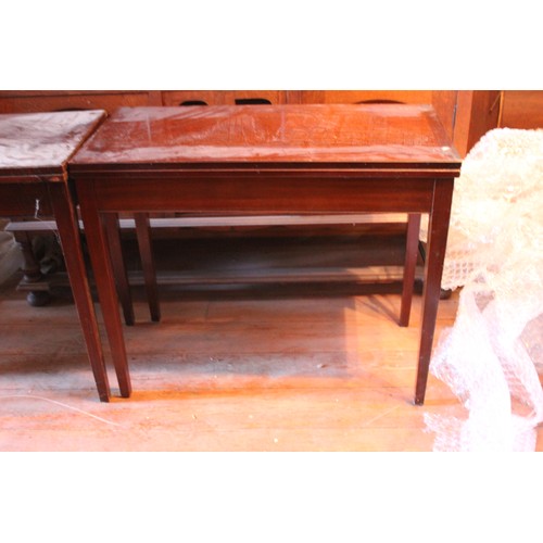 26 - A pair of 20th century mahogany card tables, on tapering legs, 91cm wide. (2)