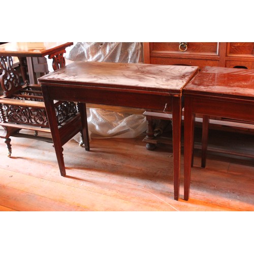 26 - A pair of 20th century mahogany card tables, on tapering legs, 91cm wide. (2)