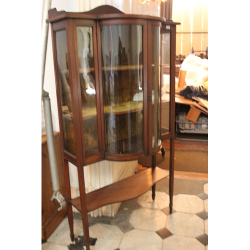 28 - An Edwardian inlaid mahogany display cabinet with bow-fronted centre, 91cm wide x 155cm high.