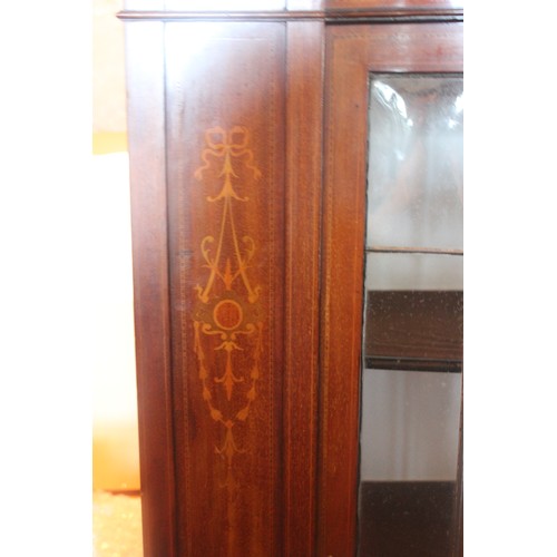 35 - An Edwardian inlaid mahogany display cabinet with leaded panels, 108cm wide x 152cm high.