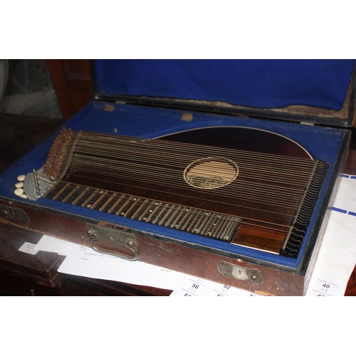 39 - A zither by 