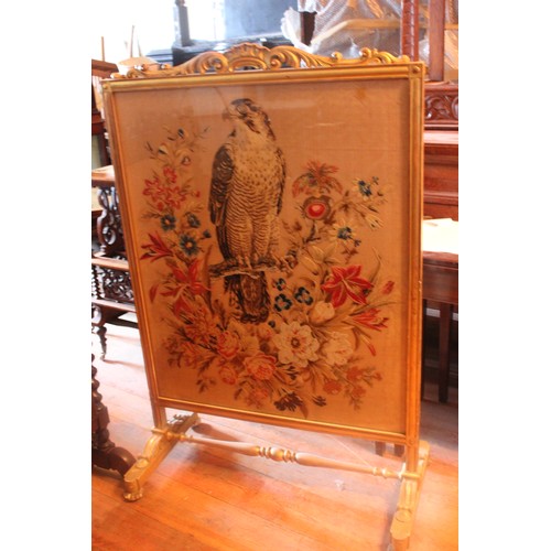 43 - An oak and marquetry inlaid tray, 72cm wide, a fire screen and a further gilt fire screen with needl... 