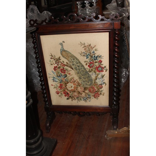 43 - An oak and marquetry inlaid tray, 72cm wide, a fire screen and a further gilt fire screen with needl... 