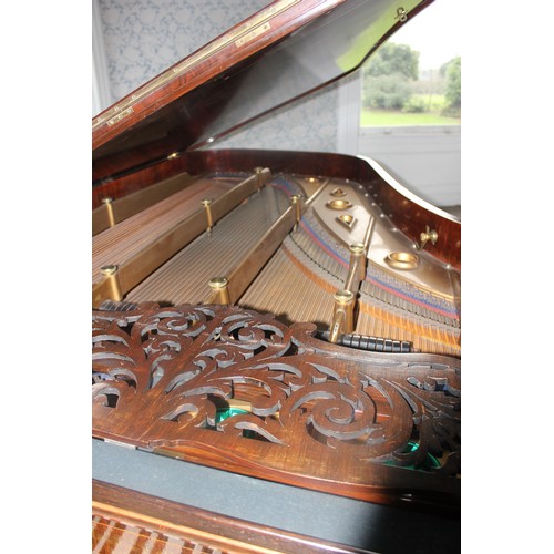 48 - A rosewood baby grand piano by 