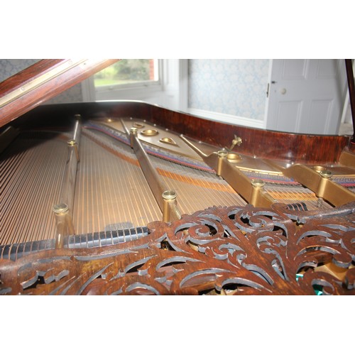 48 - A rosewood baby grand piano by 