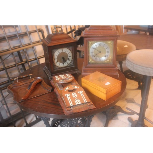 50 - An oak mantel clock, a late Victorian book rack, a crumb tray, a satin beech box, and a further cloc... 