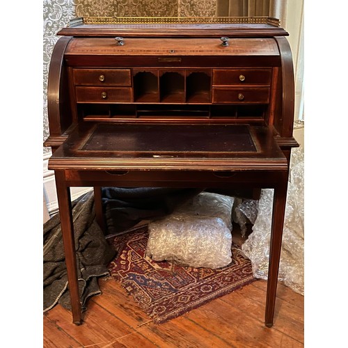 132 - A Sheraton Revival Style Inlaid Mahogany Cylinder Desk, with brass galleried top, fitted interior, a... 