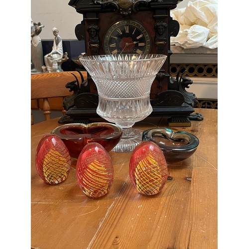 121 - A Murano-style orange glass vase, two Scandinavian-style dishes, three glass paper weights, a Campan... 