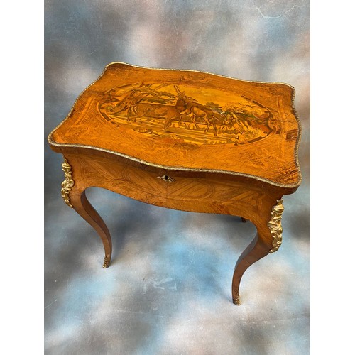 253 - A 19th century French oak kingwood and marquetry inlaid boudoir table, with gilt metal mounts, the h... 