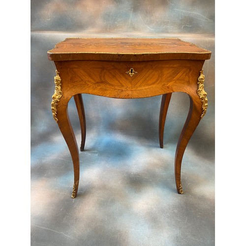 253 - A 19th century French oak kingwood and marquetry inlaid boudoir table, with gilt metal mounts, the h... 