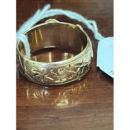 239 - A 9ct gold band ring, of belt form, approx. 6g.