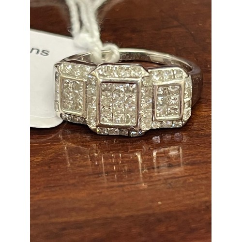 238 - An 18ct white-gold dress ring, set approx. 60 diamonds, in groups.