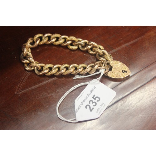 235 - A 9ct gold-link bracelet with padlock and safety chain, Birmingham 1905, approx. 24g.