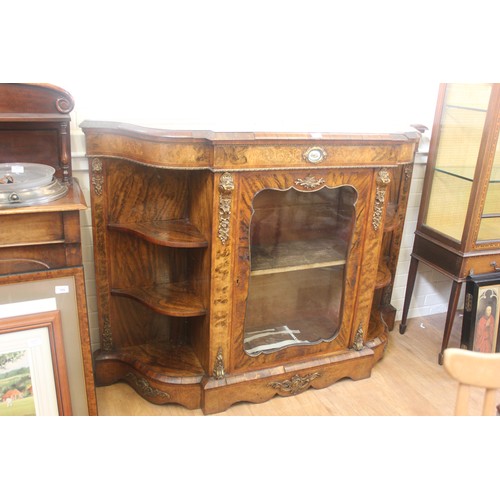 261 - A Victorian walnut credenza with gilt-metal mounts and oval porcelain medallion, the central glazed ... 